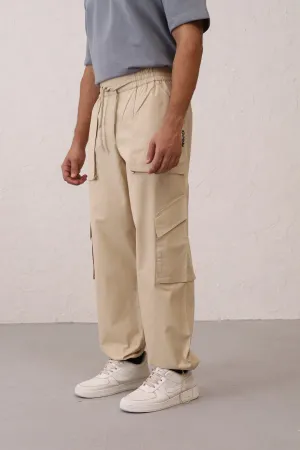 NOMAD Beige Parachute Pants